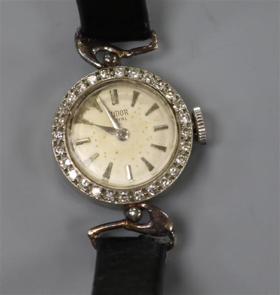 A ladys 1960s 9ct white gold Tudor manual wind wrist watch with diamond set bezel,